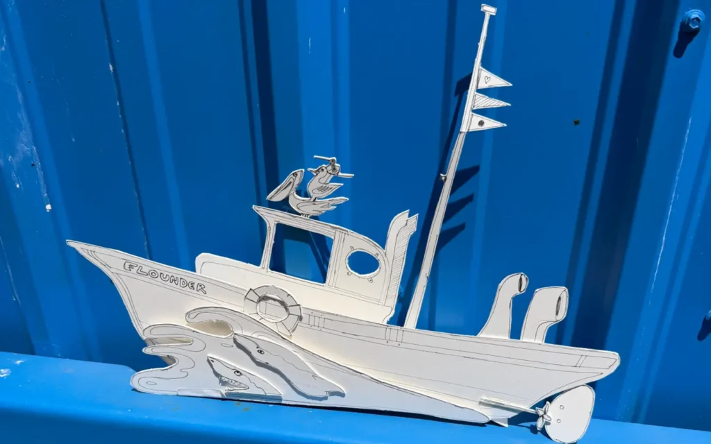 A hand-drawn sketch of a yellow submarine themed Monterrey fishing boat mural named Miss Adventure II, featuring design notes for interactive elements, water splashes,and fun fish