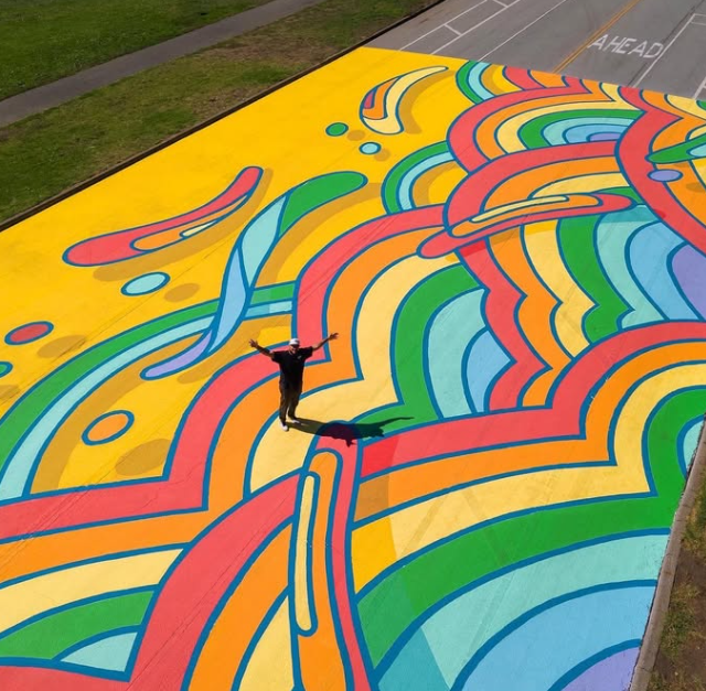 Aerial view of the "Dream In Color" ground mural by artist Matley Hurd, located on the Golden Mile of the JFK Promenade (Pioneer East Meadow) in Golden Gate Park, San Francisco.